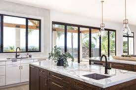 Intricate knurling and the articulating faucet display meticulous craftsmanship and elegant simplicity. Litze Pull Down Faucet With Arc Spout And Knurled Handle