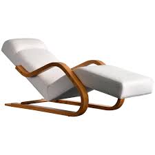 A magnificent way to offset a sofa or pair of chairs, the vintage chaise lays it all out there: Alvar Aalto Early And Rare Cantilevered Chaise In White Fabric Circa 1937 For Sale At 1stdibs
