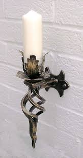 You can find wrought iron candle holders at home décor stores, but you may be able to find an even better deal online. 32 Best Wrought Iron Wall Sconce Candle Holder Ideas Iron Wall Sconces Wall Sconces Wrought Iron