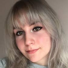 How does the IAmsterdam card give free tram and train rides and museum  access in Amsterdam?