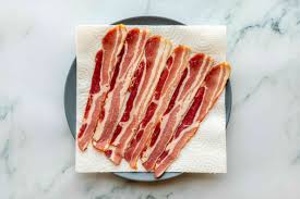 Cook soft bacon in the microwave by retaining moisture and preventing the bacon from crisping in the rendered fat. How To Microwave Bacon For Crisp And Tasty Results