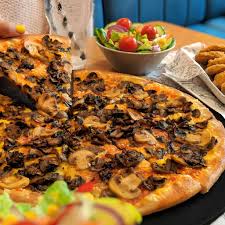 The reason behind this dual taxation is: Pizza Hut Expands Its Vegan Menu With A Brand New Pizza Nuggets And A Cheesecake