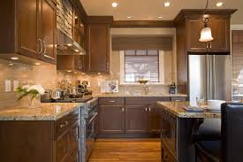 Venetian Gold Granite With Glass Subway Tile Dark Brown Cabinets Brown Kitchen Cabinets Brown Cabinets