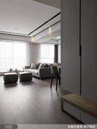 玄關鞋櫃分成上下兩段 上方吊櫃與底櫃之間留出約25 公分的距離 底櫃是一排抽屜 檯面則供屋主自由擺設小型盆栽或裝飾藝品 interior furniture interior design interior