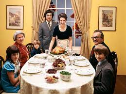 Above view of extended family talking at thanksgiving dinner. You Won T Win The Thanksgiving Fight But You Can Survive Wired