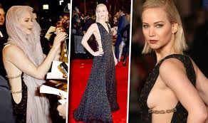 | see more about jennifer lawrence, the hunger games and katniss everdeen. Jennifer Lawrence Flashes Major Sideboob In Risque Gown At Hunger Games Premiere Celebrity News Showbiz Tv Express Co Uk