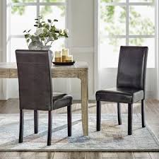 Sophisticated accent chair upholstered in genuine leather with contrasting dark legs. Ivory Leather Dining Chair Wayfair