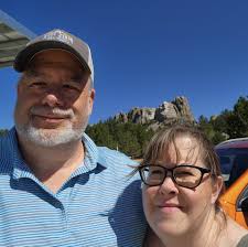 Should tulip bulbs be planted right away or stored until fall in Zone 5a/5b?