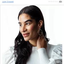 hi hall. I'm hoping you can help me identify the maker of these earrings.  They are post earrings with a 4cm drop. The style is minimalist/modernist,  with two parallel rods ending in