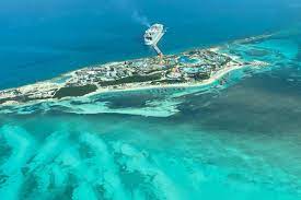 Aerial drone image of seven mile beach, west bay and george town on the island of. Visiting The Cayman Islands Remains Complicated Vax Before Travel