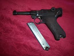 The barrel has on the right side has british insp proof marks and tonnage marks. 1913 Erfurt Luger Serial 9371 Gun Values Board