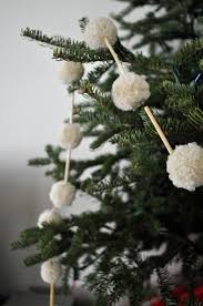 Make A Pom Pom Garland Elsie Marley Diy Christmas Garland Christmas Tree Garland Christmas Garland
