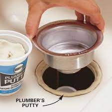 The putty will help the upper part of the drain assembly seal against the sink drain opening. How To Replace A Kitchen Sink Basket Strainer Diy Family Handyman