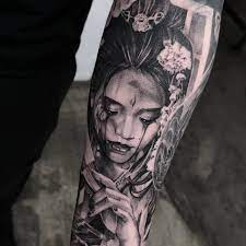 Realistic Geisha Tattoo In Black And Grey On The Sleeve Made By John Hudic In London Asian Tattoo Girl Tattoos For Women Geisha Tattoo Design