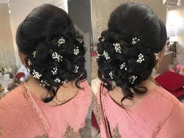 A curly updo would feature a style where the hair is positioned upward. 10 Latest And Stylish Wedding Hairstyles For Curly Hair Styles At Life