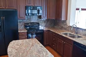 Natural stone tile for flooring along with diamond shape installed travertine backsplash are outstanding too. Typhoon Bordeaux Granite Traditional Kitchen Dc Metro By Granite Grannies Houzz