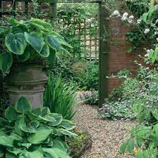 Garden Mirror Ideas To Flood Gardens With Light Garden Mirrors Small Garden Small Gardens
