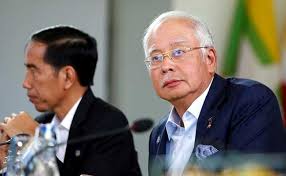 Entire pn cabinet has to resign if muhyiddin tenders resignation as pm tomorrow, says sarawak dap chief. New Malaysia Security Law Debuts As Pm Fights Critics