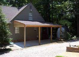 Angled Roof Attached Carport To House Carport Patio Carport Designs Pergola Patio