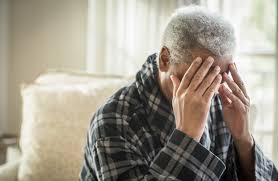 Person in middle stage of Alzheimer's requiring assistance with daily activities