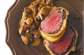 Layers of prosciutto, savory chive crepe, a mushroom mixture, and puff. Mega Meal How To Make Beef Wellington Wsj