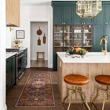 A green colour scheme is the perfect choice for those who want a kitchen that seamlessly blends classical design with a fresh pop of vibrant colour. Green Kitchen Cabinet Ideas