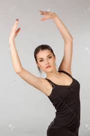 Happy Fitness Dancing. Woman Dancer With Arms Raised. Caucasian Dancer  Model On Grey Background. Stock Photo, Picture And Royalty Free Image.  Image 62152922.