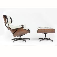 Ironically, the design proved too costly to be produced during the eames' lifetime, but in 1996 it entered production due to consumer demand. Charles Eames Lounge Chair Holstein Black White Homelosophy Homelosophy