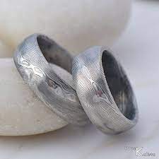 Pin By Jaclyn Schmitt On Wedding Ideas Damascus Steel Wedding Band Steel Wedding Bands Titanium Wedding Rings