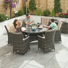 Marbled ceramic on glass top with black metal base. Sienna 6 Seat Dining Set With 1 3m Round Table