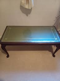 A table with a leather inlay can get abused by beverages, the oils from your hands, and the heels of your shoes. Coffee Table Glass Top Leather Inlay For Sale In Truro Cornwall Preloved
