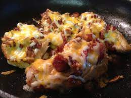 Transform a simple chicken breast by stuffing it with garlicky cheese and wrapping it in crisp streaky bacon. Cheesy Bacon Smothered Chicken Gaining Mommymentum