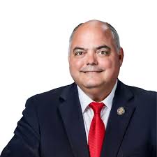 CHRISTOPHER M. DUENAS