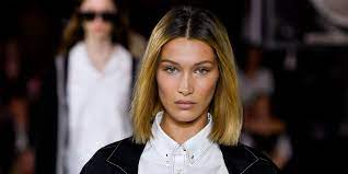 Bella hadid just ditched her signature brunette hue and debuted her brand new sunny blonde strands, and she's update, august 20th, 2:45 p.m. Bella Hadid Debuted A Blunt Bob At Burberry