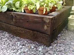 Another idea is to recycle tires into garden beds. Cheap Ways To Make Raised Beds Flowerpotman Landscape Gardener