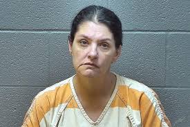 Police charge woman with arson in apartment fire