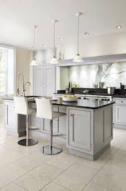 You can enhance your kitchen having an excellent appliance with traditional white granite worktop or the same colour could be used as a modern decoration with a modern appliance. 21 Creative Grey Kitchen Cabinet Ideas For Your Kitchen Grey Kitchens Grey Kitchen Cabinets Gray Cabinets Black Counter