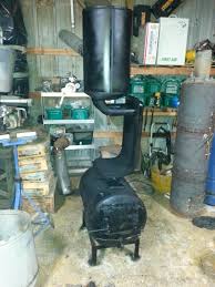 Homemade Wood Burning Stove Made From An Old Water Heater Tank And A Gas Furnace Heat Chamber Not The Best Thin Gas Bottle Wood Burner Wood Heater Wood Burner