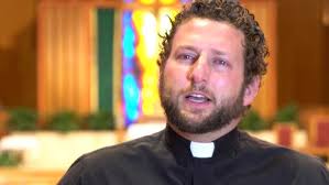 Catholic Priest with gift of healing helps weeping woman outside of Planned  Parenthood Pittsburgh