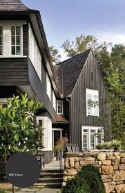 Green olive exterior paint of clapboard siding house. 12 Dark Exterior Paint Colors We Re Loving In Action Chris Loves Julia