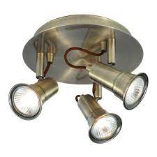 The light's exquisite vintage style fits most furnishing styles and is great for lighting up dining rooms, kitchens, and living rooms as well as commercial applications like restaurants and pubs perfect light source: Eros 3 Flame Spotlight Disc Antique Brass Antique Brass Clad Structural Steel Etc Shop Lamps Furniture Technology Household All From One Source Etc Shop