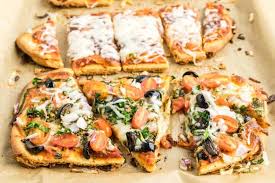 Skip the sauce when making flatbread pizza, because it can make the thin crusts soggy. Easy Flatbread Pizza Kid Friendly Pizza Recipe For Lunch Dinner Or Snacks