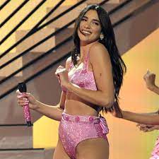 After working as a model, she signed with warner bros. Watch Dua Lipa Perform Don T Start Now Levitating With Dababy At Grammys 2021 Pitchfork