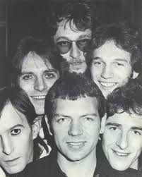 In 1977, Whilst living and working at Chestnut Studios, Sandy joined  "Headwaiter", a progressive rock band formed by songwriter Tony Leach and  ex-"Camel" bassist Doug Ferguson. The band featured 2 live drum