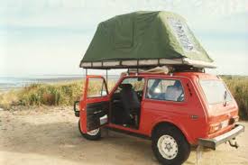 A Tent Topped Lada Niva Is A Pretty Compact Camping Setup Roof Tent Motorcycle Camping Gear Motorcycle Camping