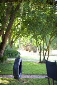 Tyre Swing For Fun In The Garden Make Outdoors Fun Country Gardening Outdoor Play Spaces Outdoor Kids Play Area