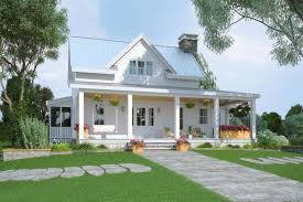 A wrap around porch can extend partially beyond the façade, or often fully wraps the house and joins with a rear deck. 5 Bedroom Two Story Modern Farmhouse With Wraparound Porch Floor Plan Home Stratosphere