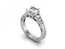 This style features two strips of metal that curve around the finger and hold the diamonds in place with. Dallas Round Channel Engagement Diamond Ring Shira Diamonds