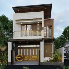 Desain tampak depan ini ada yang terkesan mewah, namun ada juga yang lebih simpel dan sederhana, pilihan desain bisa disesuaikan dengan selera dan budget yang dimiliki. Desain Rumah Modern 2 Lantai Ibu Silvi Di Surabaya
