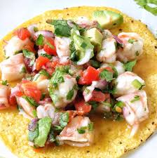 An Easy Mexican Shrimp Ceviche Recipe With Avocado Cilantro Tomatoes Red Onion It S Served On Tost Best Ceviche Recipe Ceviche Recipe Shrimp Ceviche Recipe